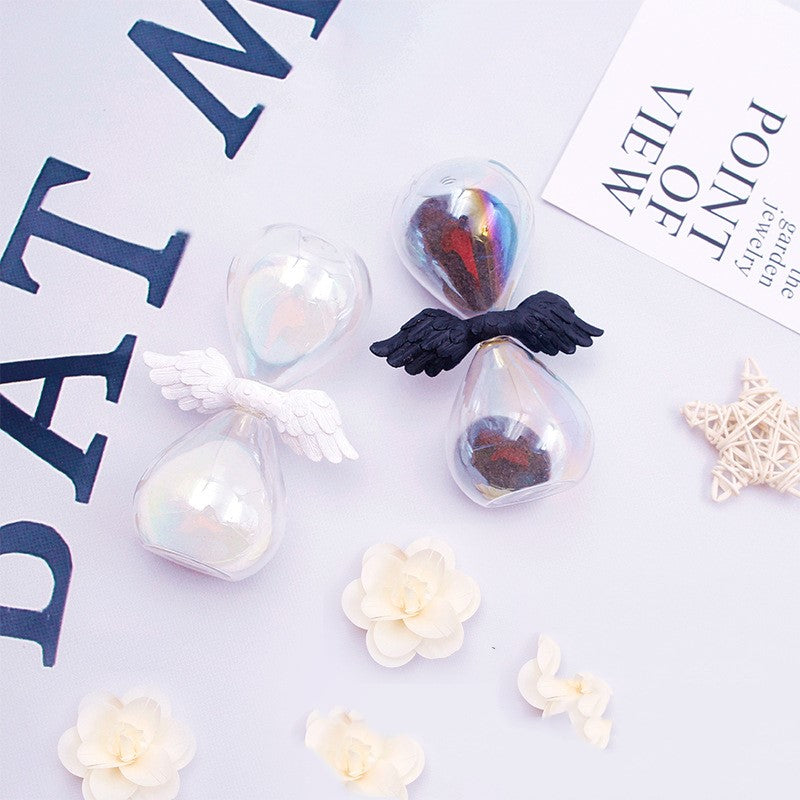 Angel wings hourglass timer small ornament